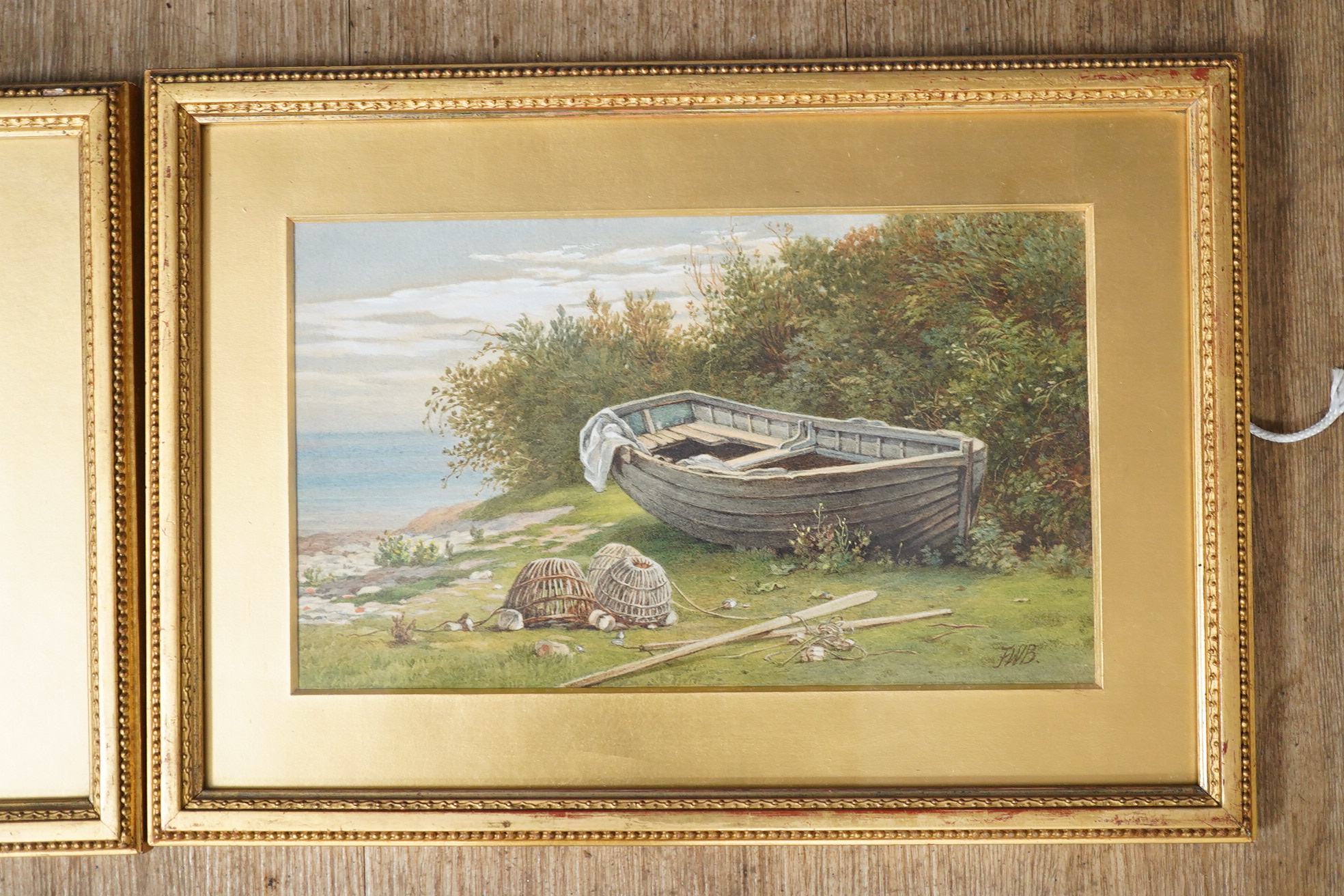 F.W.B., pair of watercolours, Boat shed and Beached boat, each monogrammed, 16 x 27cm, housed in gilt frames. Condition - fair to good